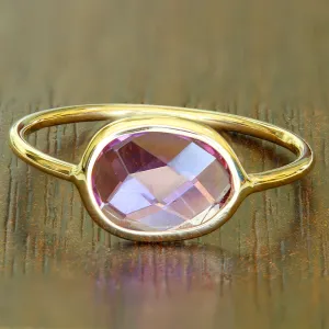 1.45ct. Oval Pink Sapphire Ring in 14K Yellow Gold