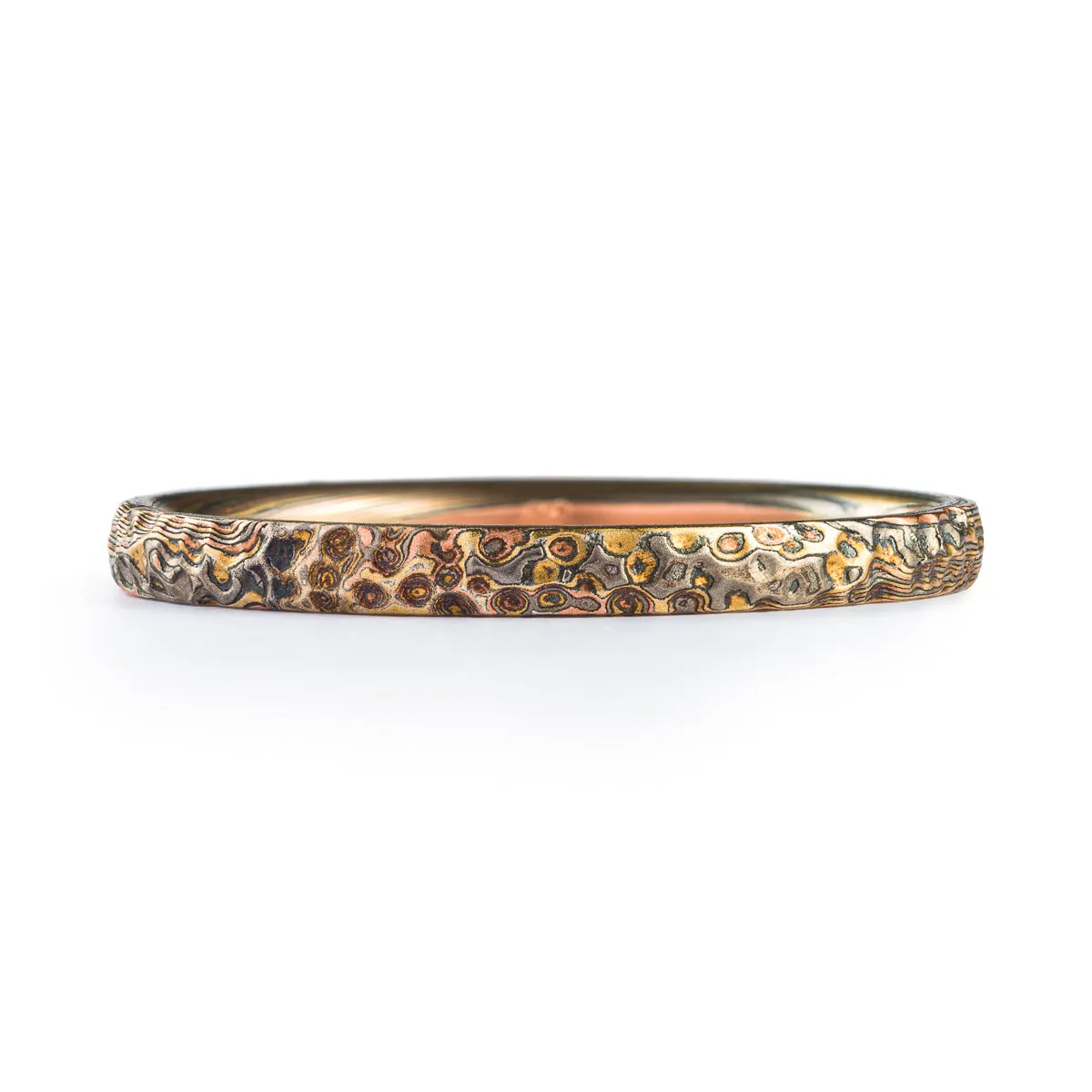Dainty Earthen Mokume Firestorm Twist Ring with Hammered Finish