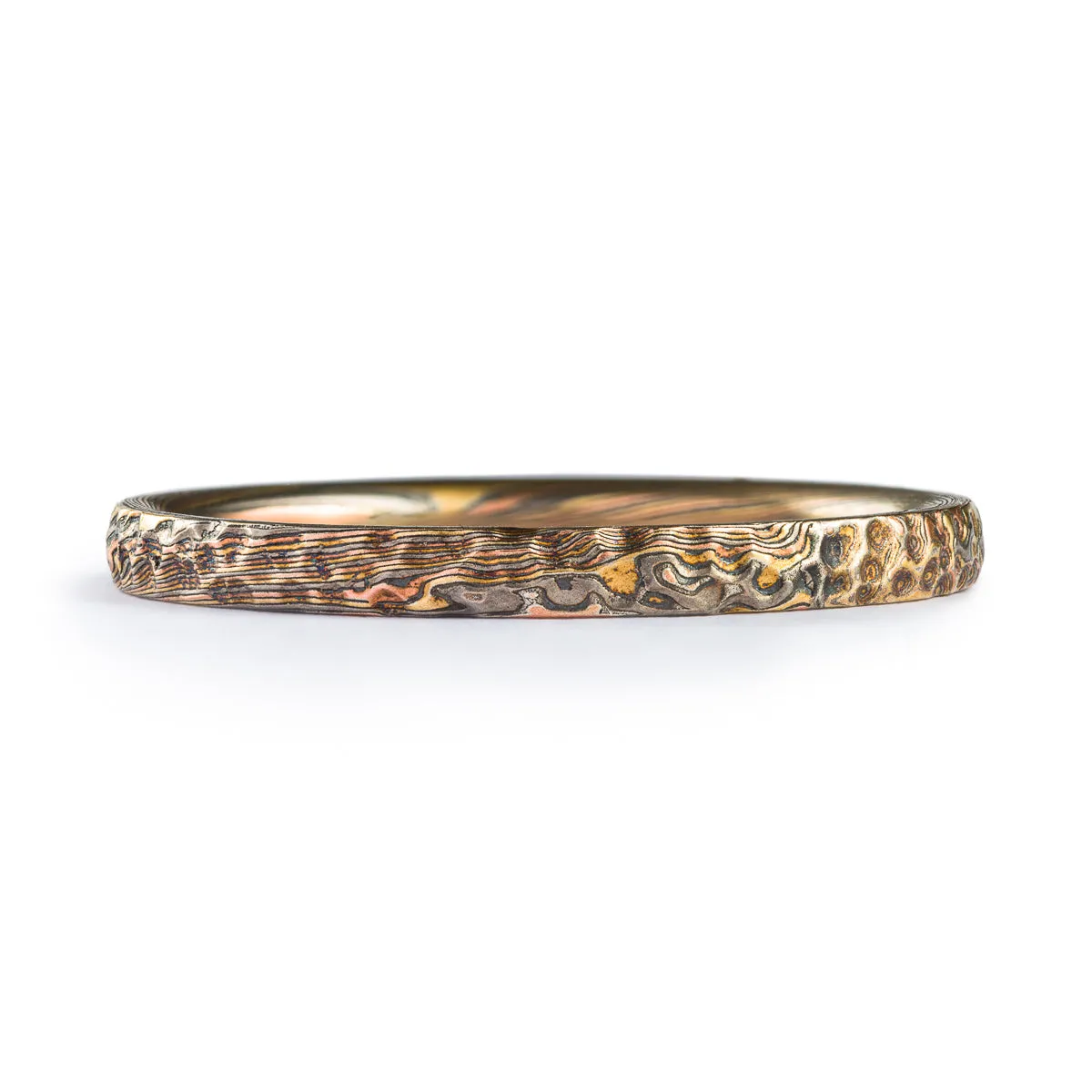 Dainty Earthen Mokume Firestorm Twist Ring with Hammered Finish
