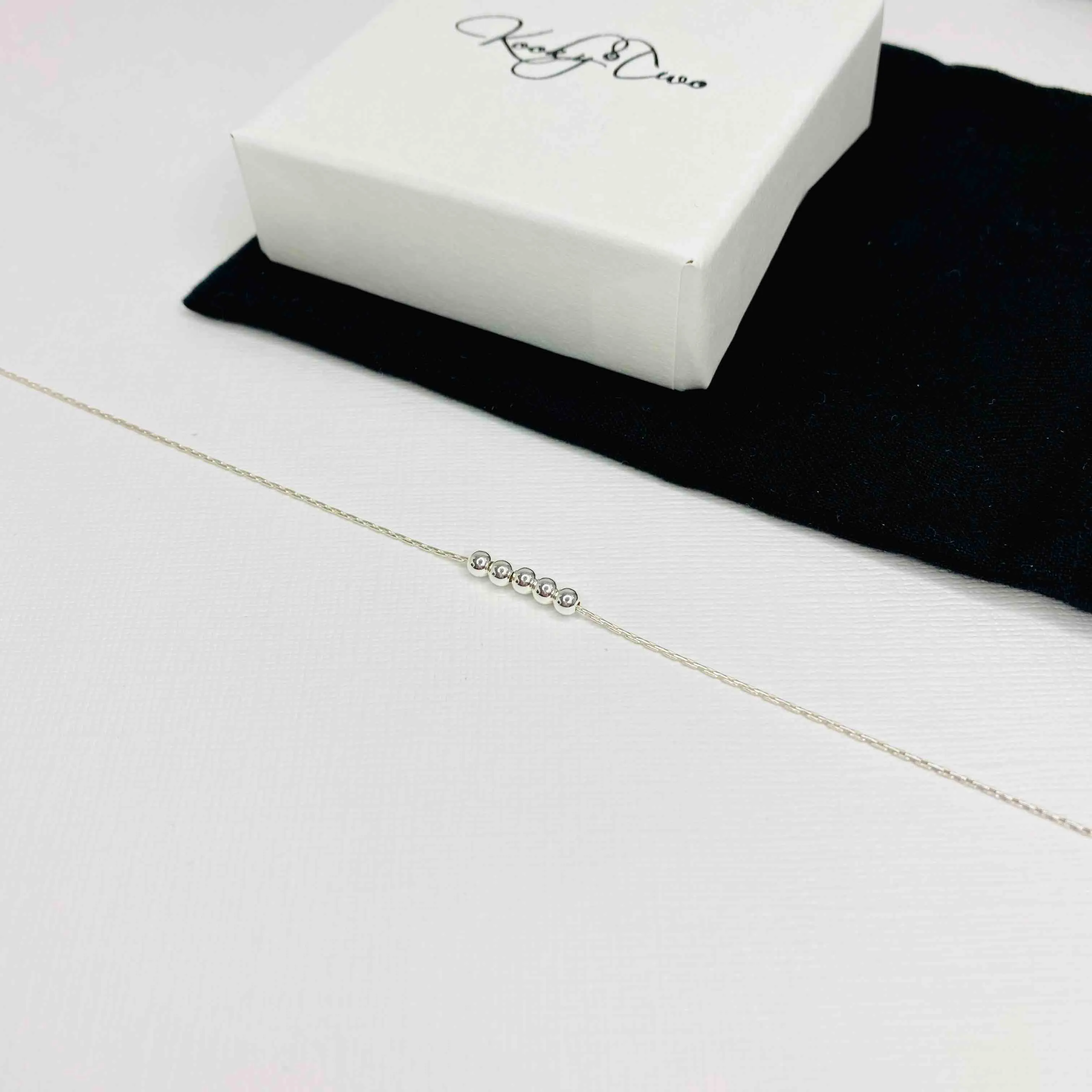 Dainty Multiple Silver Bead Necklace