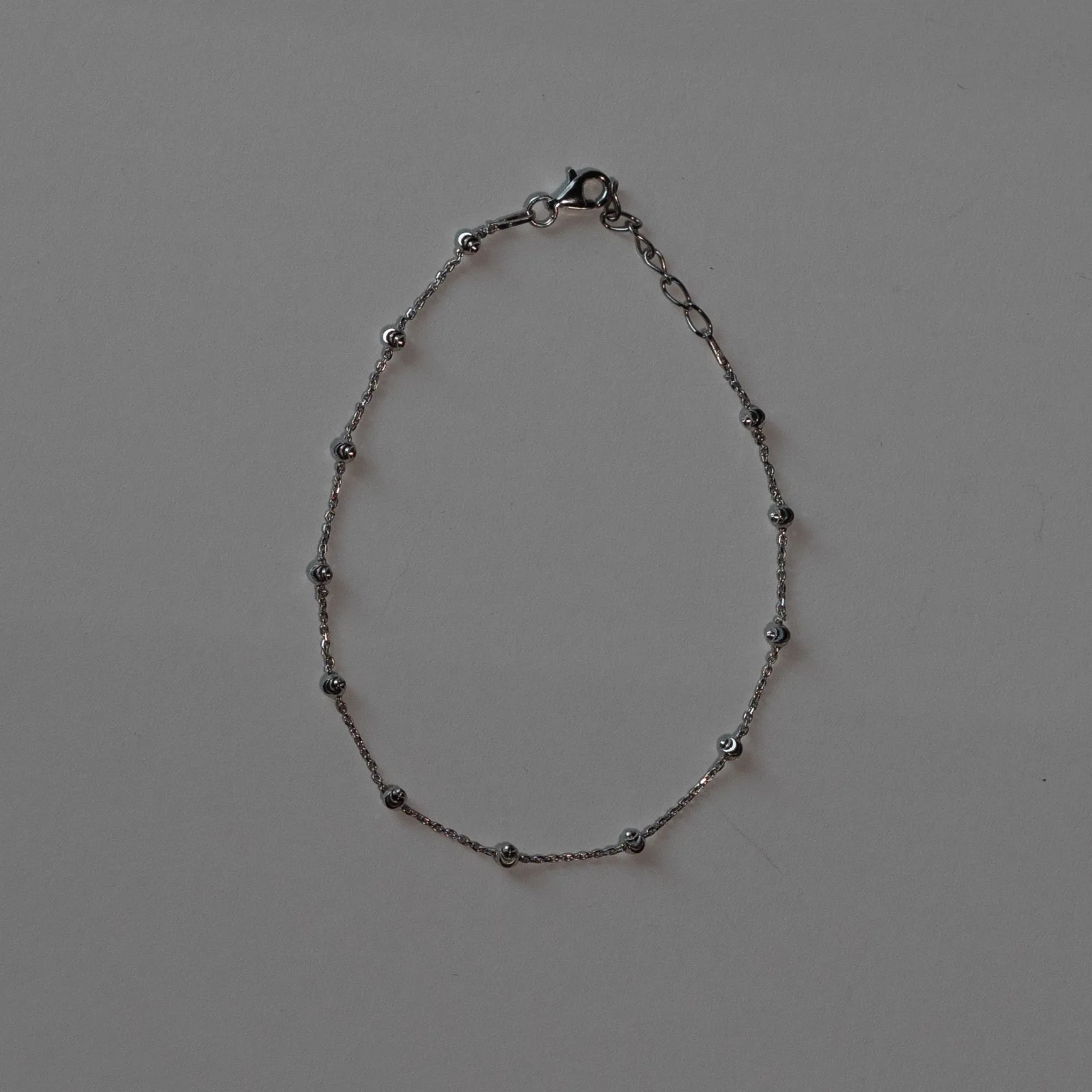 Duncan Silver Moon Cut Bead Anklet