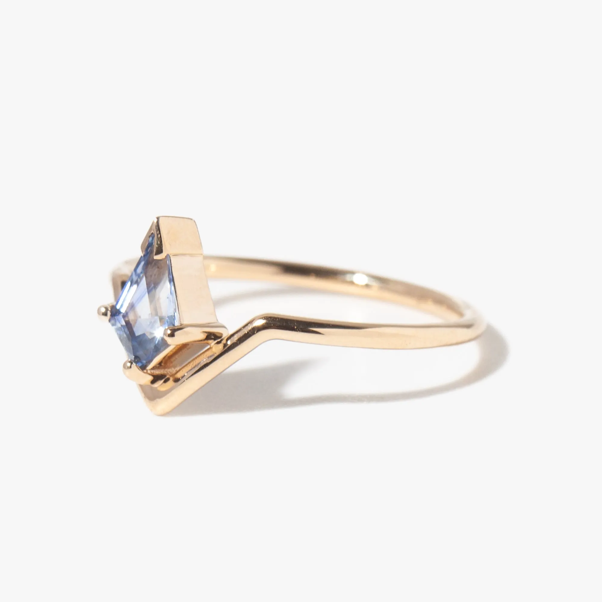 Kite Cut Blue Sapphire Nestled Ring