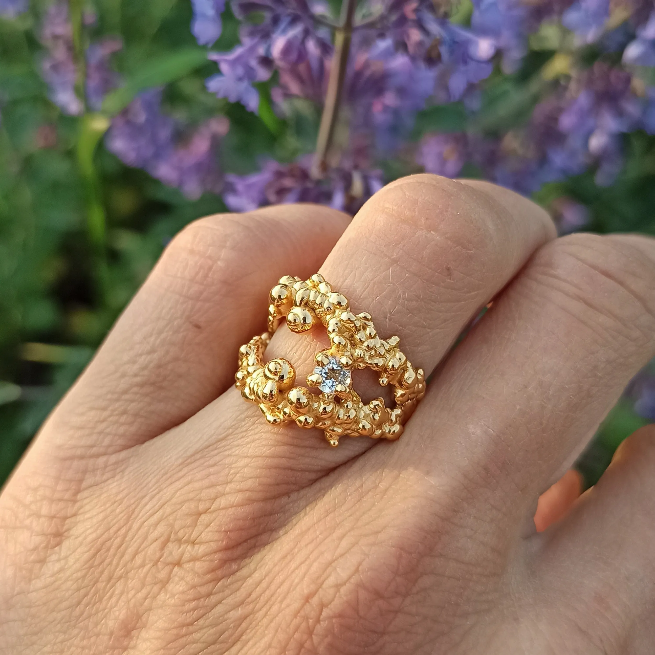 Mammatus Big Gold Ring with White Topaz