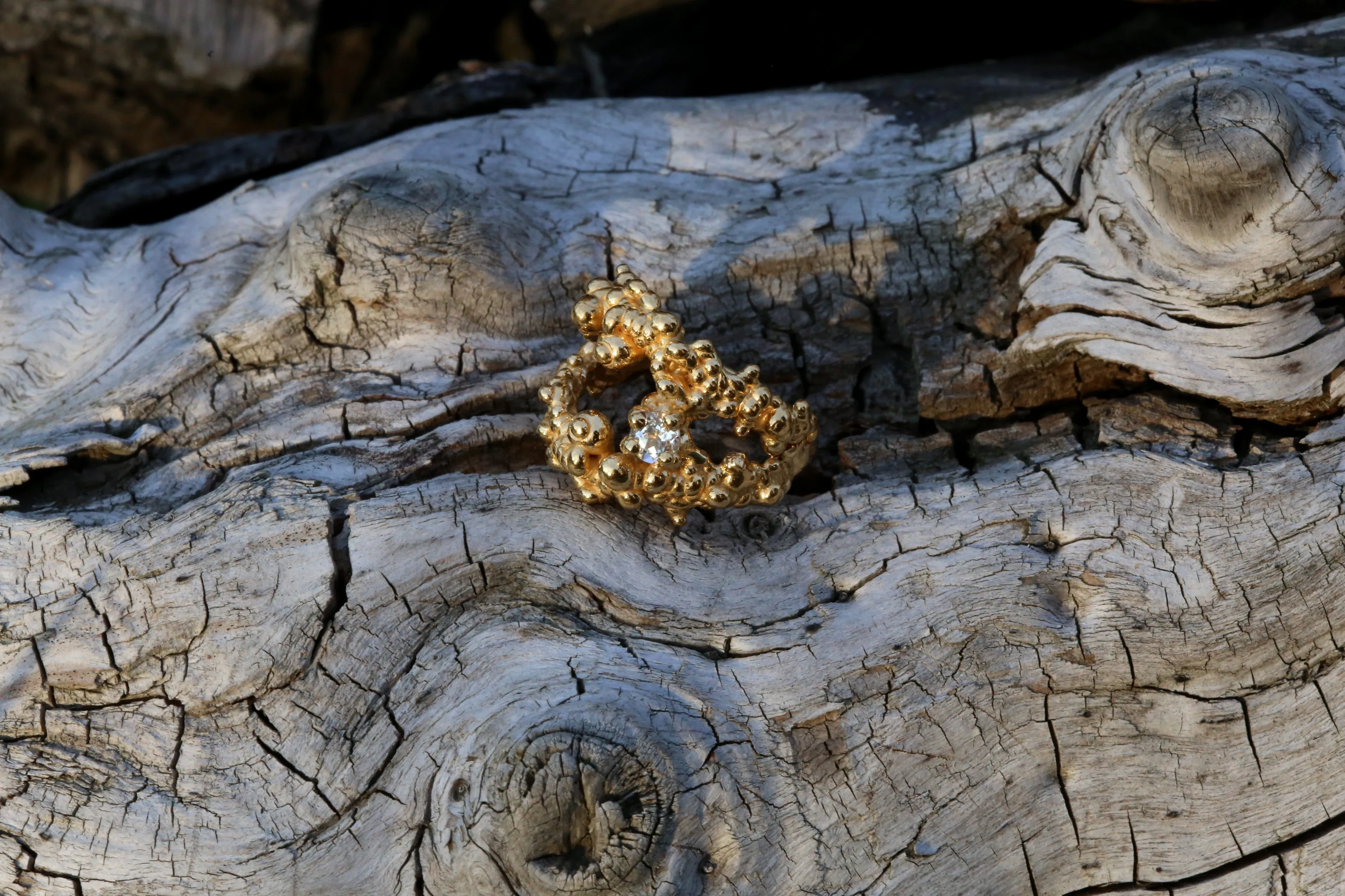 Mammatus Big Gold Ring with White Topaz