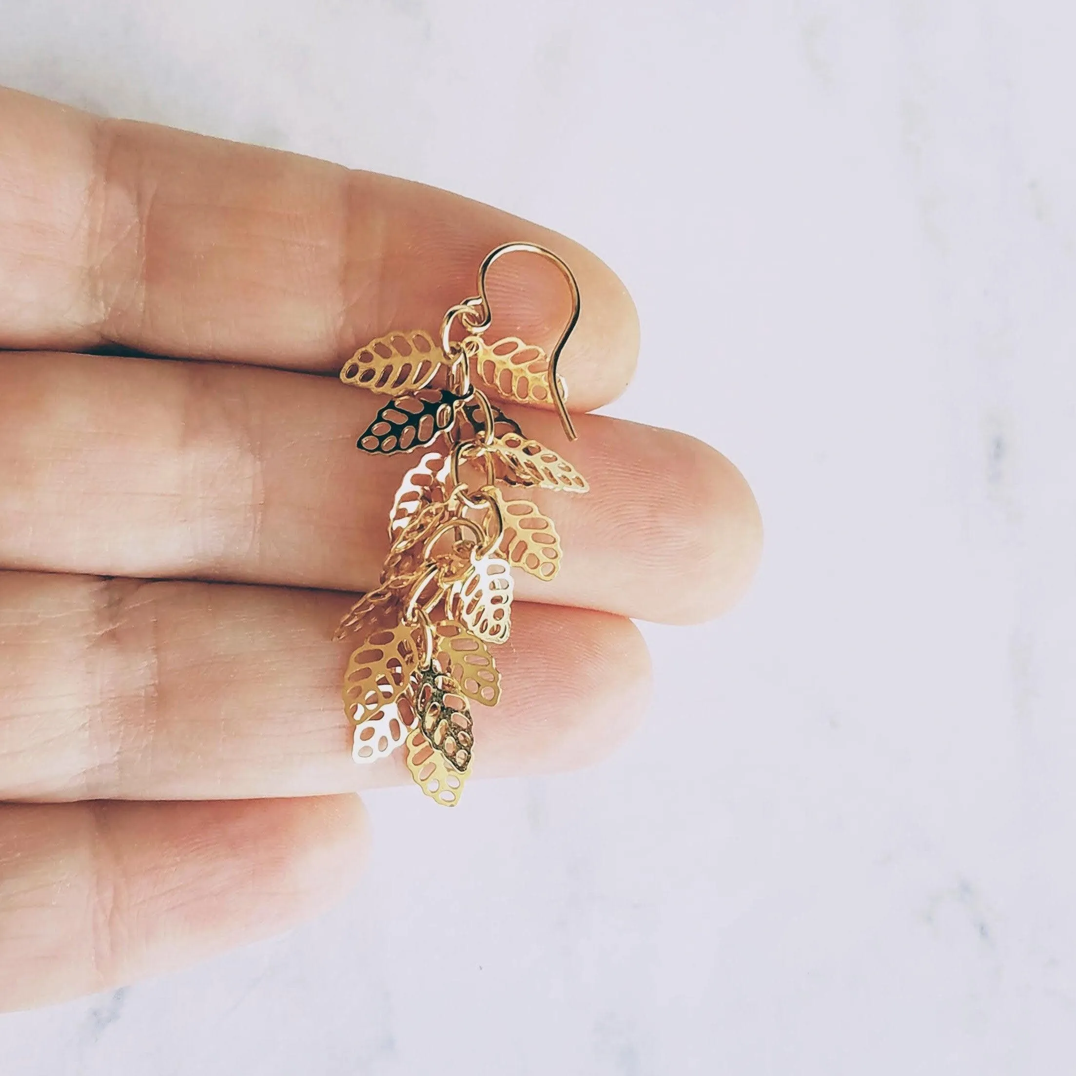 Shaggy Leaf Earrings - long thin gold cascade fringe of small little tiny staggered filigree leaves on simple dainty delicate hooks