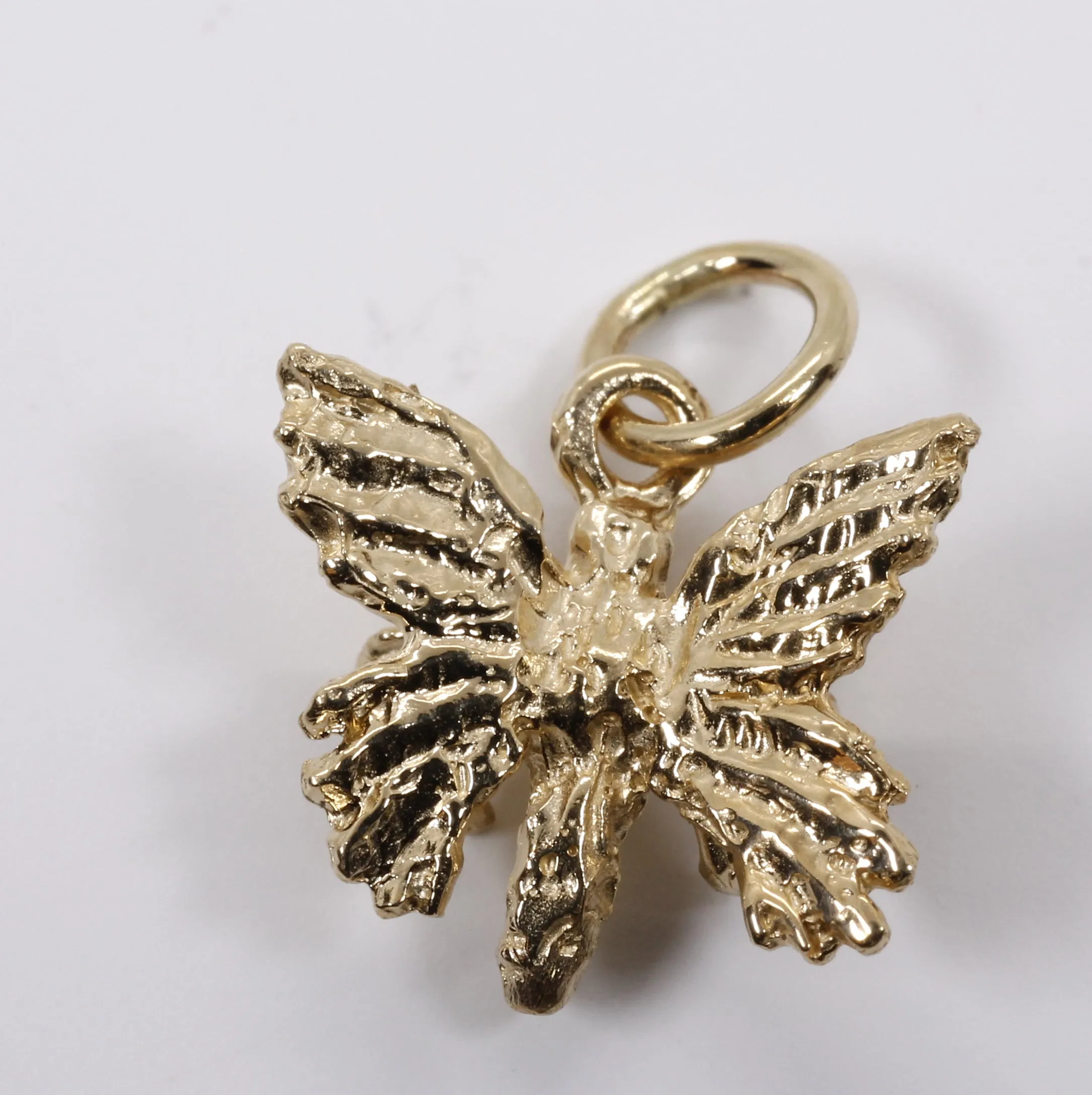 Small 3-D Butterfly Charm made in 14kt gold