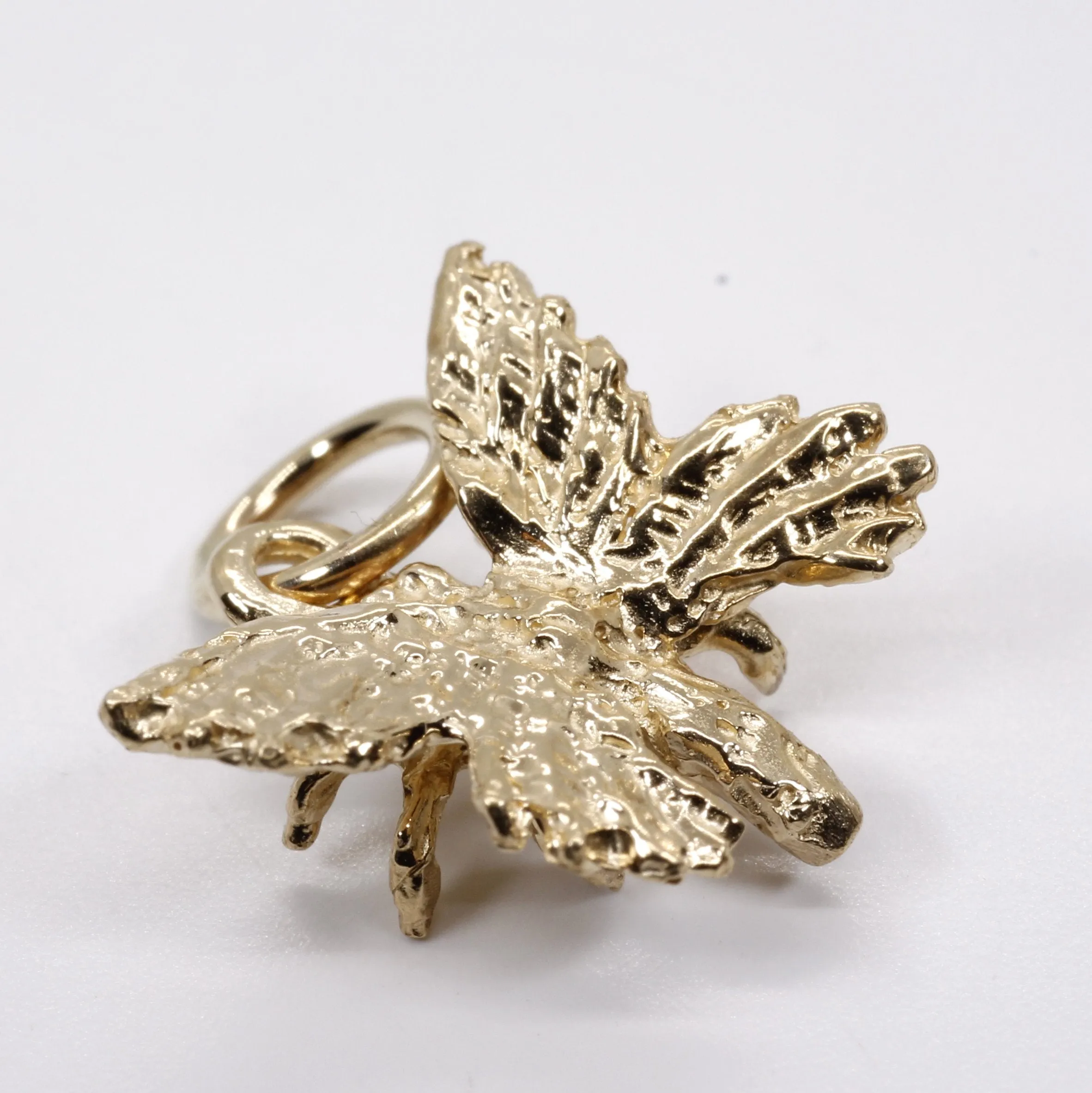 Small 3-D Butterfly Charm made in 14kt gold