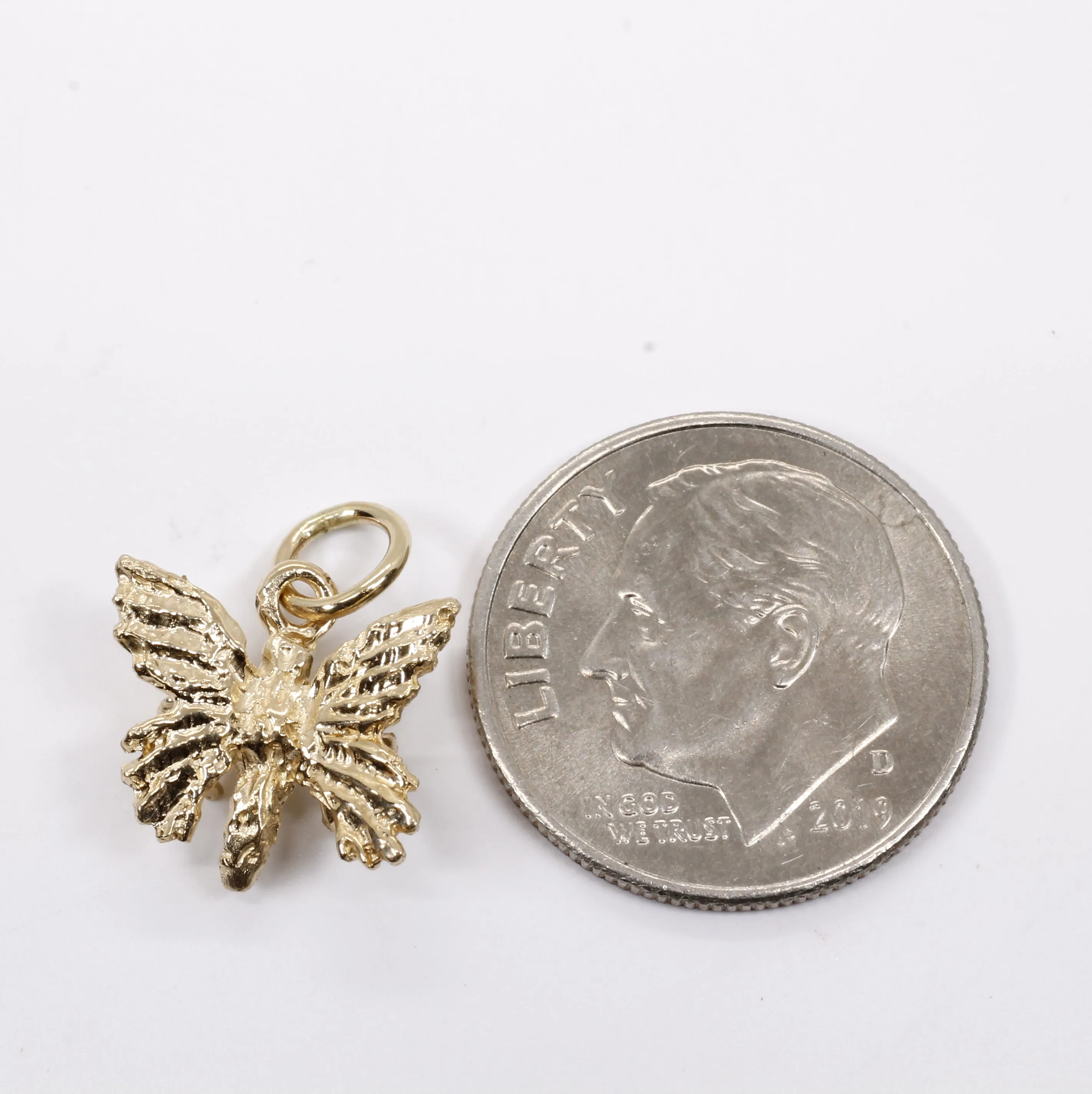 Small 3-D Butterfly Charm made in 14kt gold