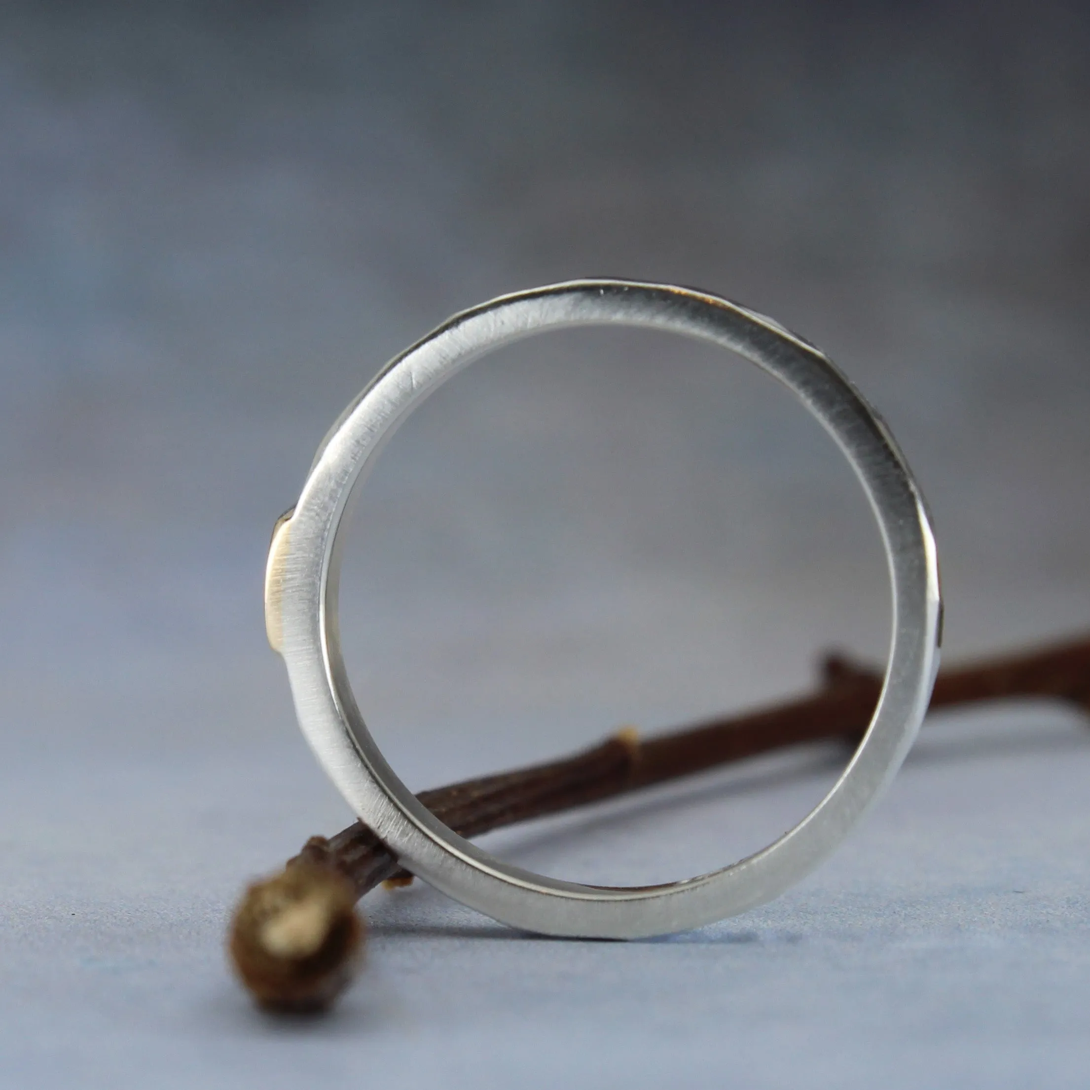 Stackable sterling silver ring with paw symbol on 10k gold tab