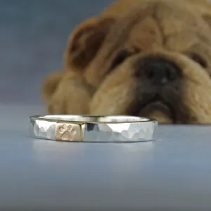 Stackable sterling silver ring with paw symbol on 10k gold tab