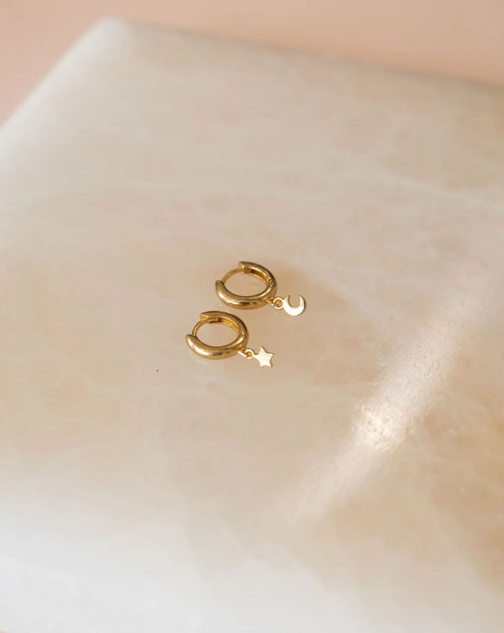 Star and Moon Huggie Hoop Earrings in Gold