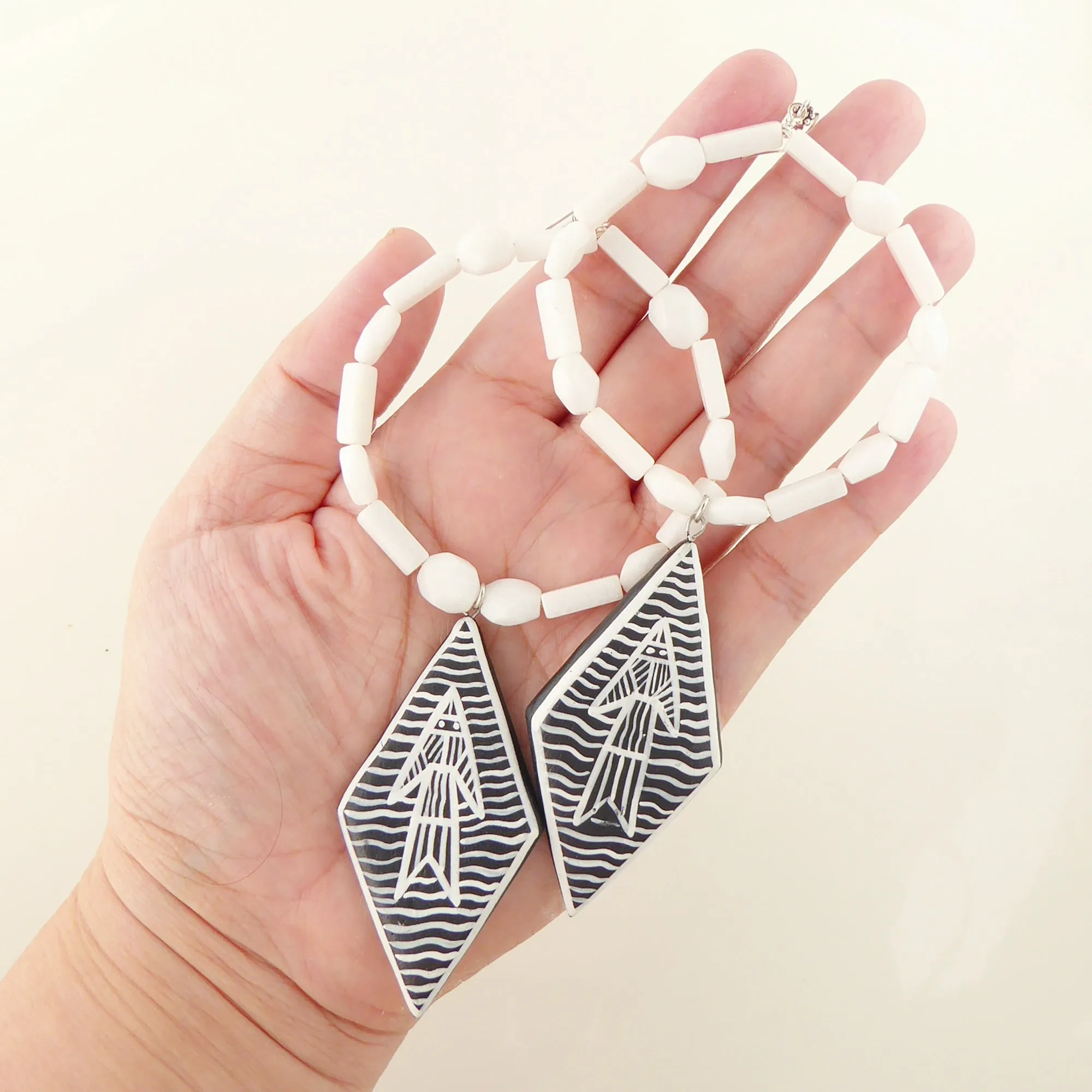 White jade abstract fish earrings