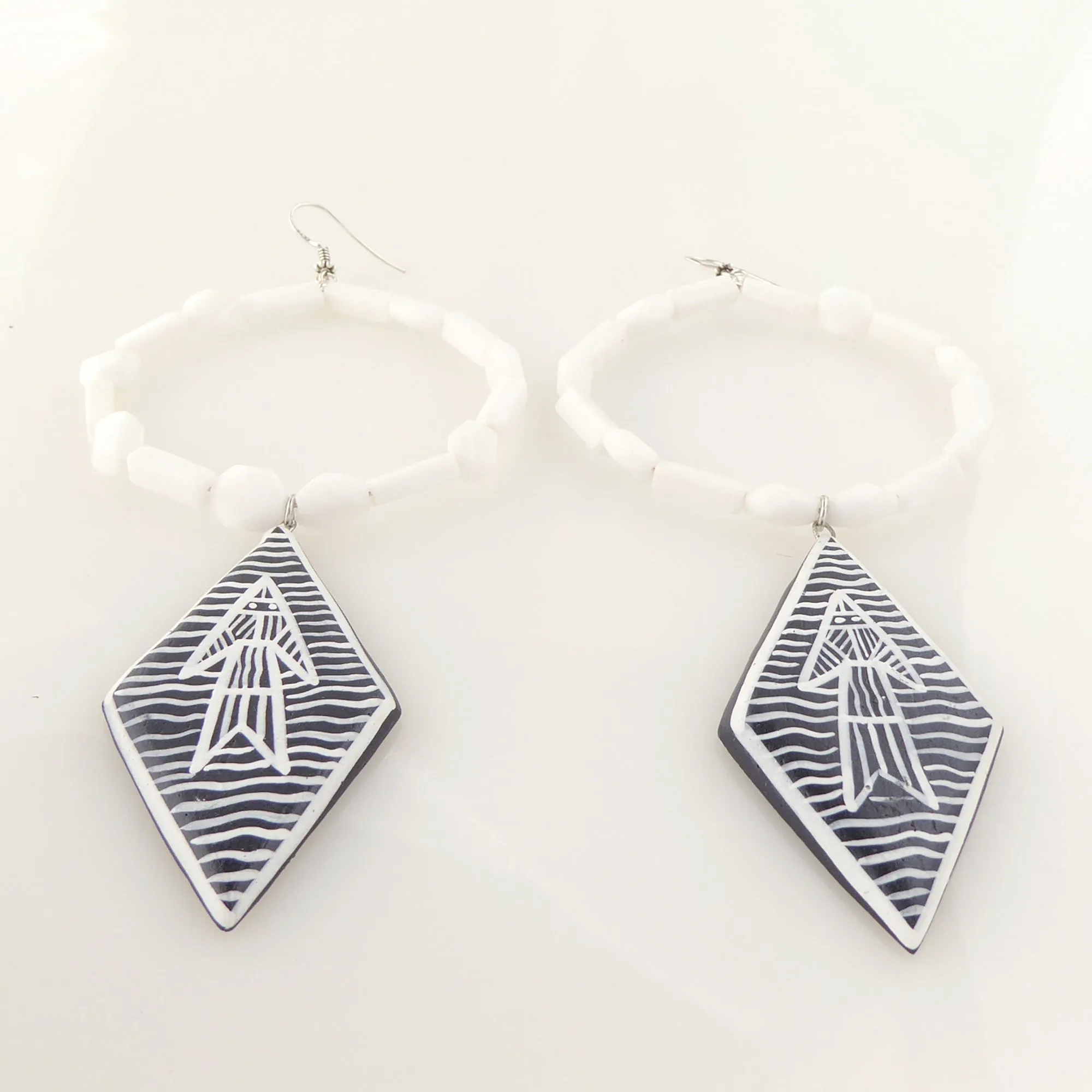 White jade abstract fish earrings