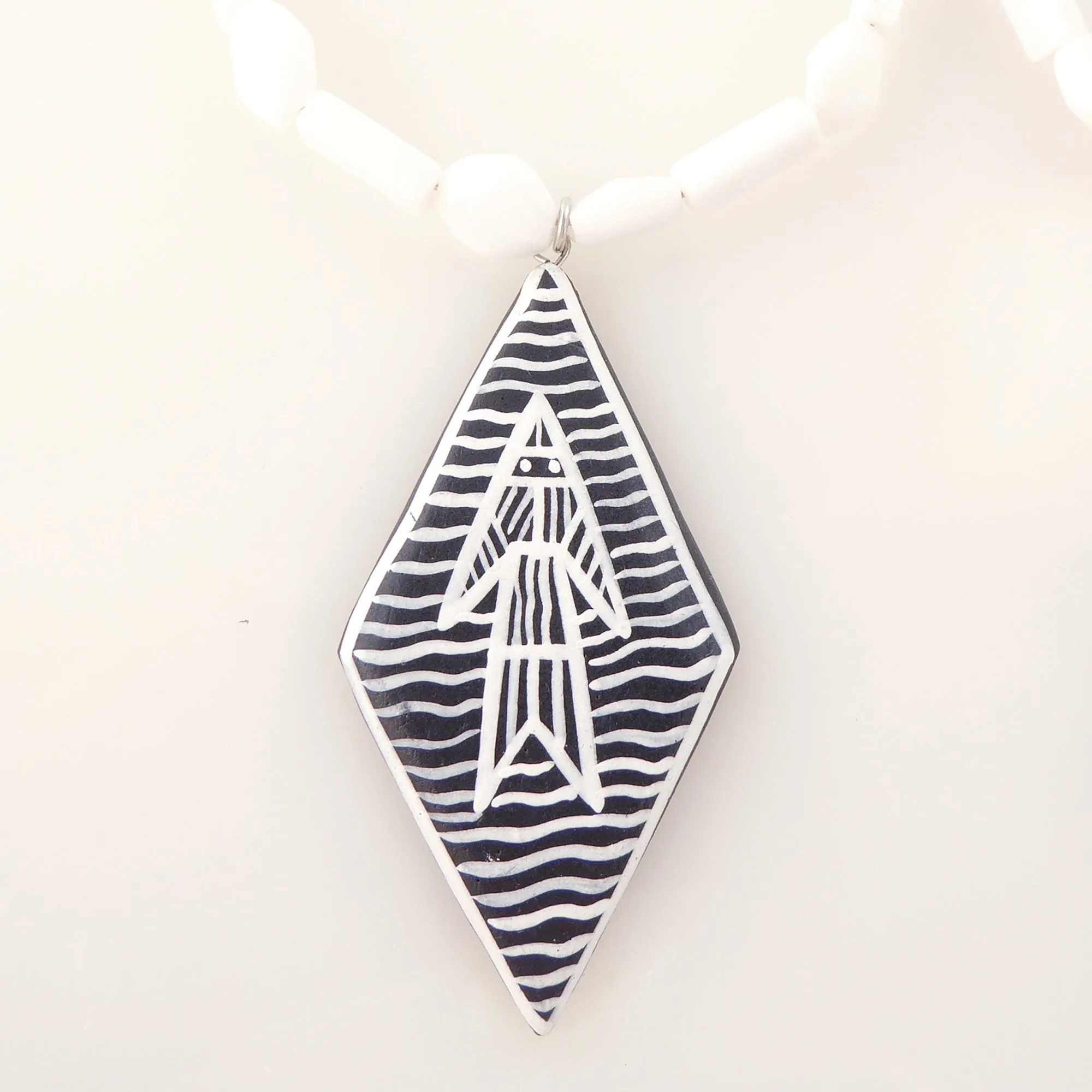 White jade abstract fish earrings
