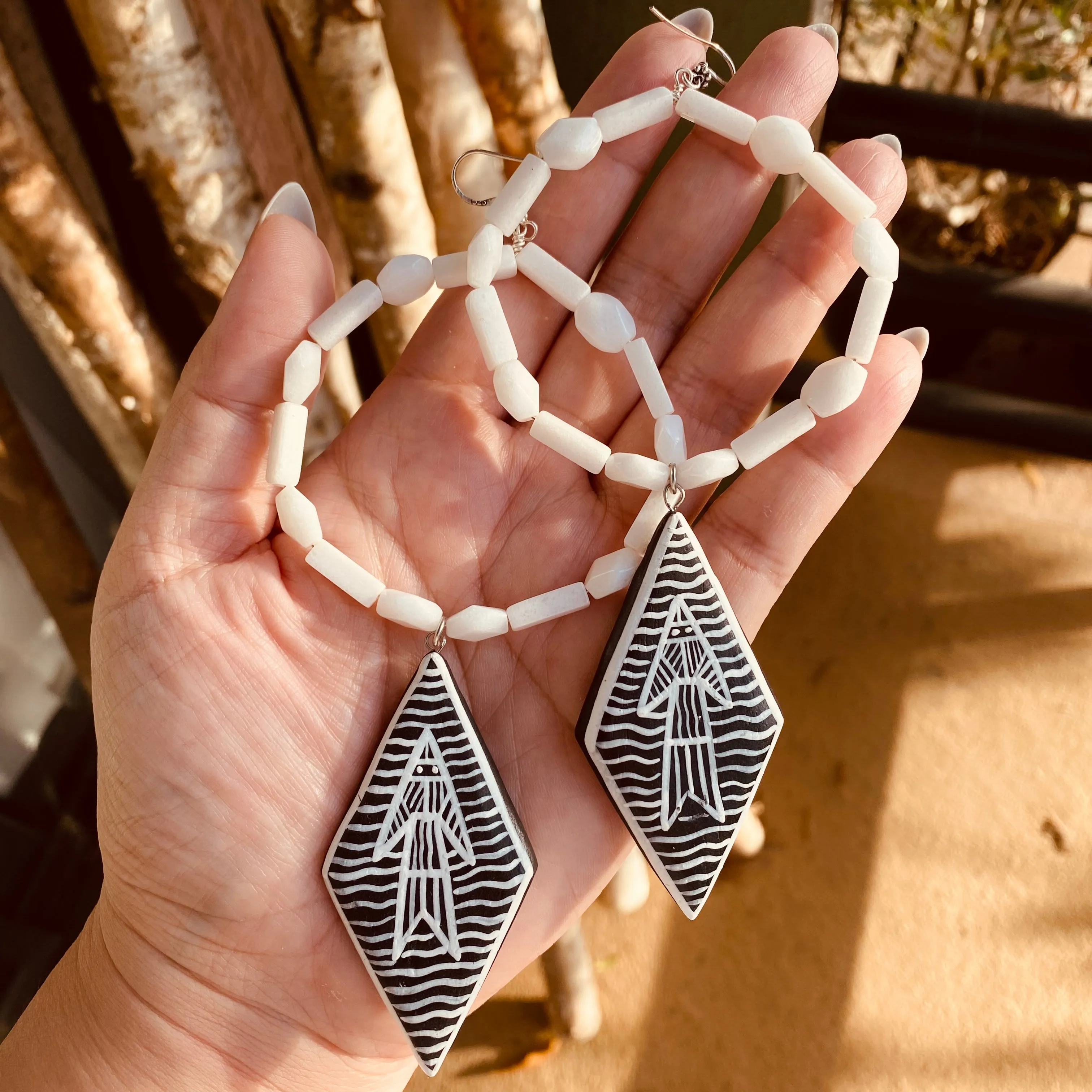 White jade abstract fish earrings